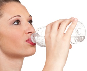 a woman drinking water